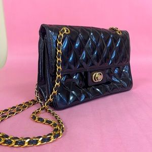 Patent leather quilted bag.